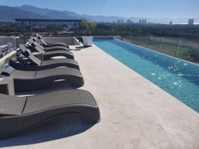 Hermoso condominio con alberca climatizada